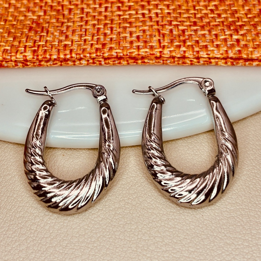 Elegant Silver Textured Oval Hoop Earrings